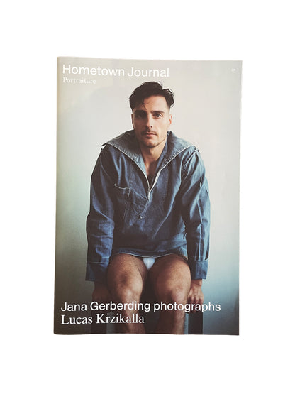 Book cover of 'Hometown Journal Portraiture' with a man in a blue pullover on a white background